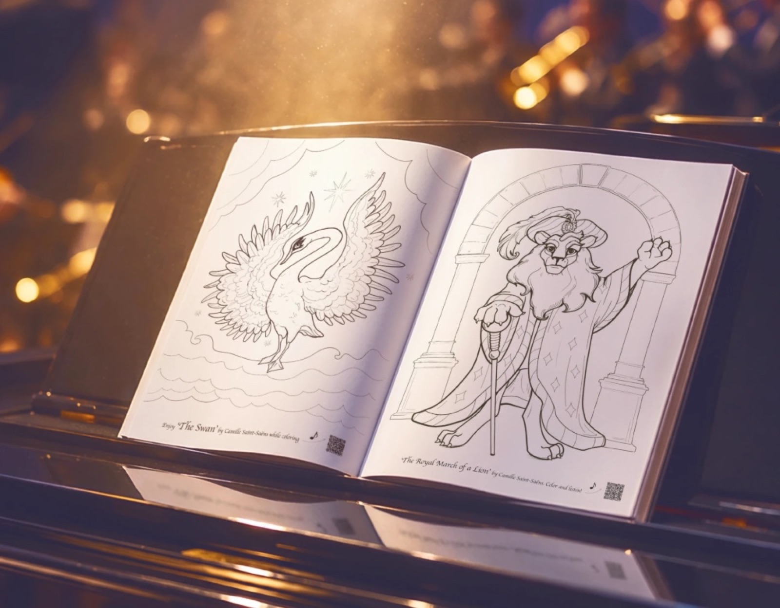 The musical coloring book open on a grand piano: the swan and the royal march of the lion